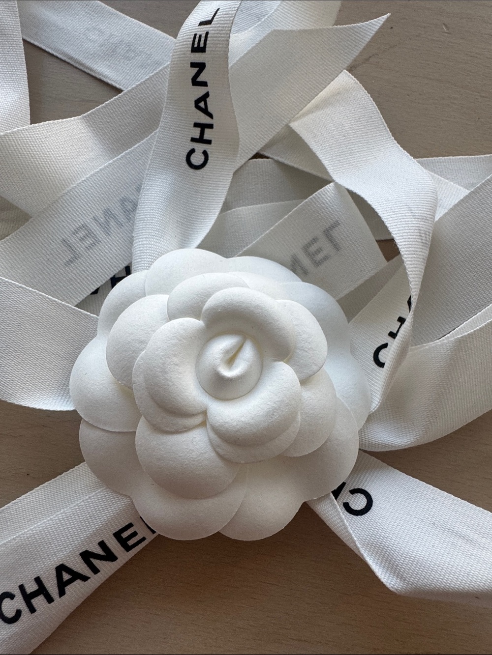 CHANEL White Camellia Ribbon Accent with Logo Print
